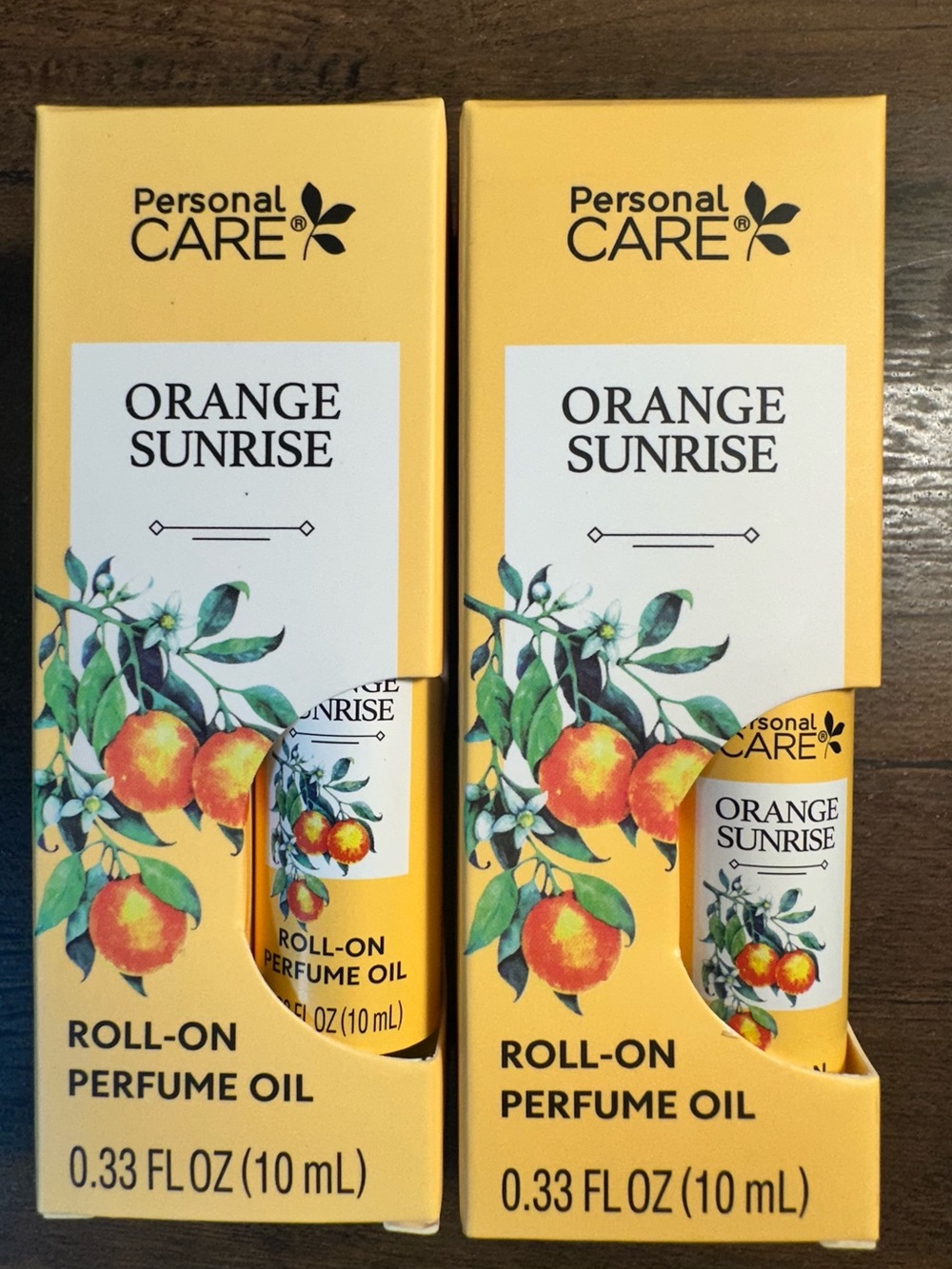 PERSONAL CARE 2 Pk ORANGE SUNRISE 
ROLL ON PERFUME .33 FL OZ EACH BNIB
